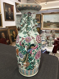 A Chinese famille rose vase with phoenixes and pheasants among blossoming branches, 19th C.