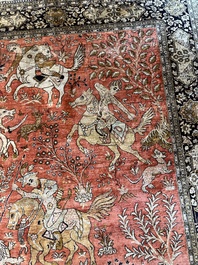 A Persian Qom (Qum/Ghom) silk rug with hunting scenes, 20th C.