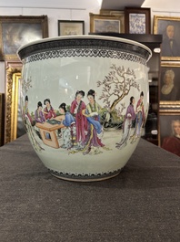 A Chinese famille rose fish bowl with ladies in a garden, 20th C.