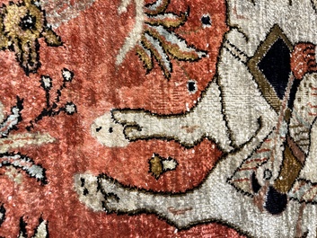 A Persian Qom (Qum/Ghom) silk rug with hunting scenes, 20th C.