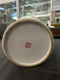 A Chinese famille rose baluster vase with birds among blossoming branches, Qianlong mark, Republic, 20th C.