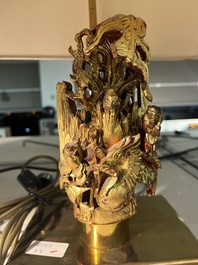 Two pairs of table lamps with South-Chinese reticulated gilt wooden carvings, 20th C.