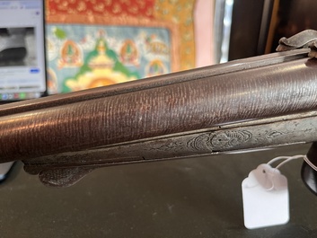A French double-barreled pinfire hunting rifle with damask barrels and engraved breechblocks, marked, second half 19th C.