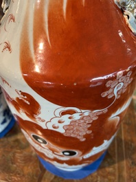 Two Chinese iron-red 'Buddhist lions' vases, 19th/20th C.