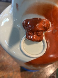 Two Chinese iron-red 'Buddhist lions' vases, 19th/20th C.