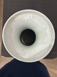 A Chinese famille rose vase with phoenixes and pheasants among blossoming branches, 19th C.