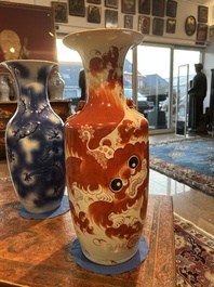 Two Chinese iron-red 'Buddhist lions' vases, 19th/20th C.