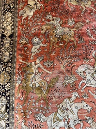 A Persian Qom (Qum/Ghom) silk rug with hunting scenes, 20th C.