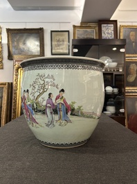 A Chinese famille rose fish bowl with ladies in a garden, 20th C.