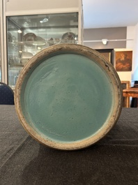 A Chinese famille rose 'antiquities' vase and cover, 19th C.