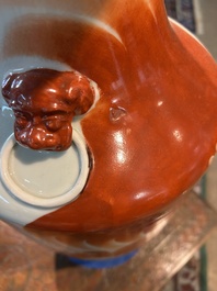 Two Chinese iron-red 'Buddhist lions' vases, 19th/20th C.