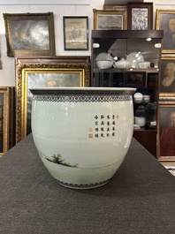 A Chinese famille rose fish bowl with ladies in a garden, 20th C.