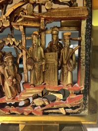 Two pairs of table lamps with South-Chinese reticulated gilt wooden carvings, 20th C.