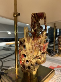 Two pairs of table lamps with South-Chinese reticulated gilt wooden carvings, 20th C.