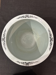 A Chinese famille rose fish bowl with ladies in a garden, 20th C.