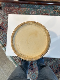 A Chinese famille rose vase with roosters among blossoming branches, 19th C.