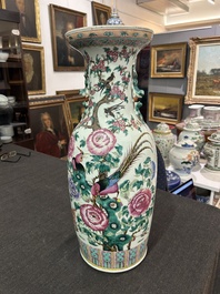 A Chinese famille rose vase with phoenixes and pheasants among blossoming branches, 19th C.
