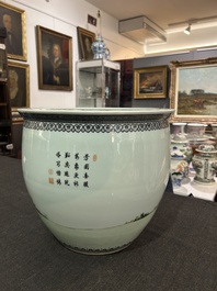 A Chinese famille rose fish bowl with ladies in a garden, 20th C.