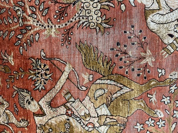 A Persian Qom (Qum/Ghom) silk rug with hunting scenes, 20th C.