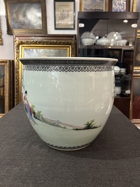 A Chinese famille rose fish bowl with ladies in a garden, 20th C.