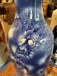 A Chinese blue and white 'dragons' vase, 19th C.