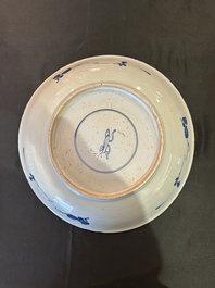 Three Chinese blue and white dishes and one polychrome dish, Kangxi and 19th/20th C.