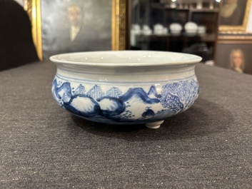 A Chinese blue and white tripod censer with figures in a landscape, 19th C.