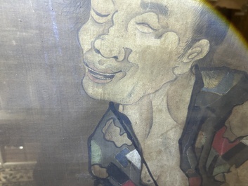 Chinese school: A blind beggar with a dog, ink and colours on silk, probably Ming