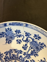 Three Chinese blue and white dishes and one polychrome dish, Kangxi and 19th/20th C.