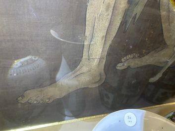 Chinese school: A blind beggar with a dog, ink and colours on silk, probably Ming