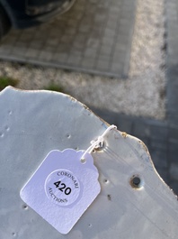 A polychrome Delftware birdcage plaque, Tichelaar, Makkum, Friesland, 19th C.