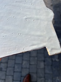 A polychrome Delftware birdcage plaque, Tichelaar, Makkum, Friesland, 19th C.