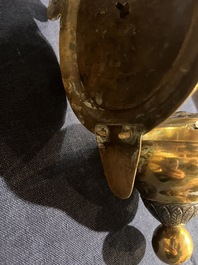 Een Vlaamse zilveren 'Golgotha' ex-voto, een 'Lam Gods' wijwatervat in koper en zilver en een reliek van Marg.-Marie Alacoque met filigraan, 18de/19de