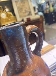 Een steengoed baardmankruik met dubbele adelaar en twee kruiken, 17de/18de eeuw