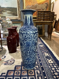 A pair of Chinese famille rose vases and a tall blue and white vase, 19th/20th C.