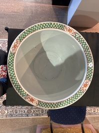 A Chinese famille verte fish bowl with birds among blossoming branches, 19th C.