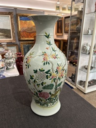 A pair of Chinese famille rose vases and a tall blue and white vase, 19th/20th C.