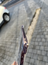 A polychrome Delftware birdcage plaque, Tichelaar, Makkum, Friesland, 19th C.