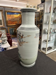 A Chinese famille rose rouleau vase with immortals in a garden, Qianlong mark, 20th C.