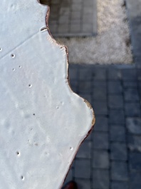 A polychrome Delftware birdcage plaque, Tichelaar, Makkum, Friesland, 19th C.