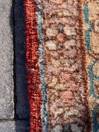 A Turkish Sivas rug with central medallion and floral design, wool on cotton, 20th C.