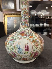A Chinese Canton famille rose bottle vase, 19th C.
