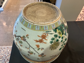 A Chinese famille verte fish bowl with birds among blossoming branches, 19th C.