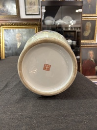 A Chinese famille rose 'antiquities' vase and a vase with figures in a garden, 19th/20th C.