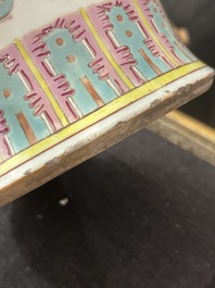 A Chinese famille rose 'antiquities' vase and cover, 19th C.