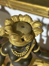 A gilt and patinated bronze Consulate pendule 'A l'Am&eacute;rique', Jean-Simon Deverberie, Paris, 1800-1804
