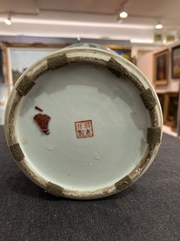 A pair of Chinese famille rose vases and a tall blue and white vase, 19th/20th C.