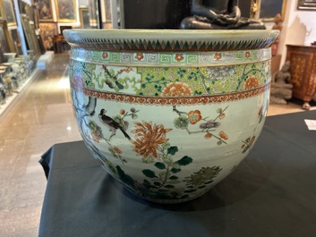A Chinese famille verte fish bowl with birds among blossoming branches, 19th C.
