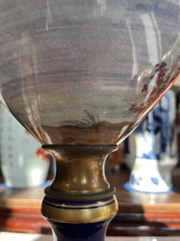 Een paar grote S&egrave;vres porseleinen vazen met allegorie&euml;n van 'De oogst' en 'De visvangst' op verguld bronzen monturen, Frankrijk, 19de eeuw