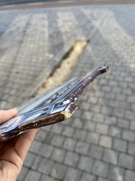 A polychrome Delftware birdcage plaque, Tichelaar, Makkum, Friesland, 19th C.